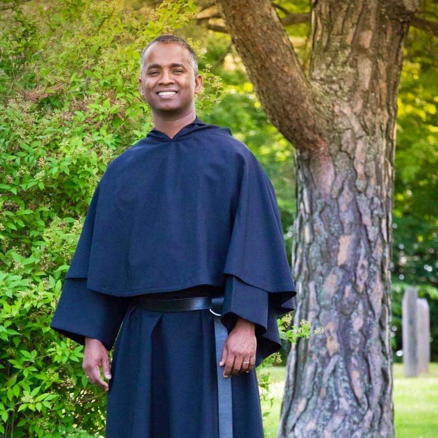 Portrait photo of Father John